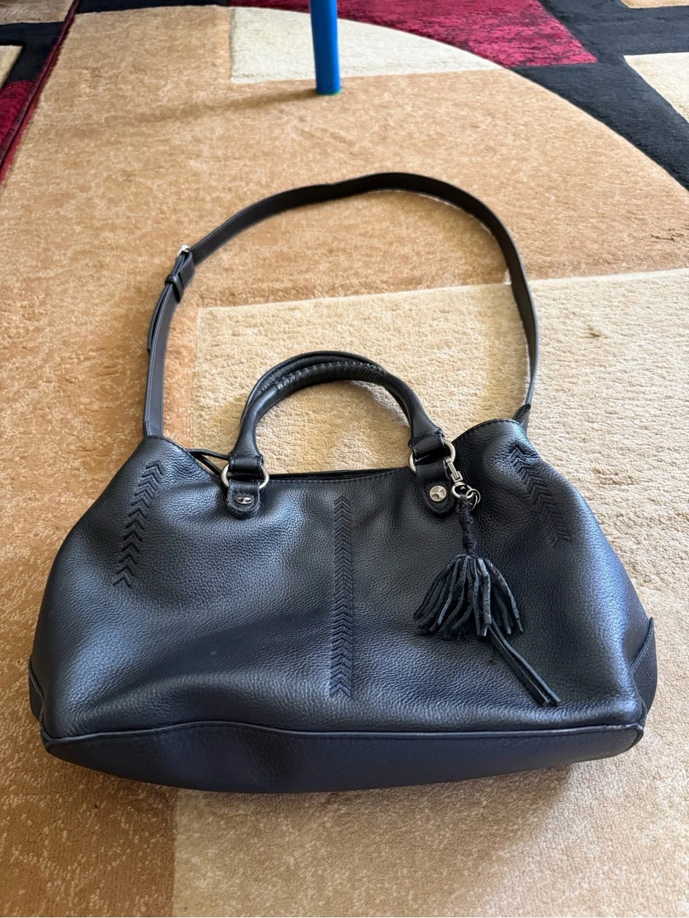 The Sak Black Leather Tote Bag with Tassel Accent